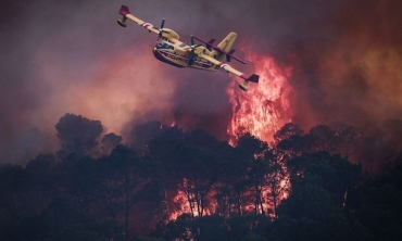 AFP__20260723__C2YU9CT__v5__MidRes__TopshotFranceEnvironmentClimateWeatherWildfire.jpg
